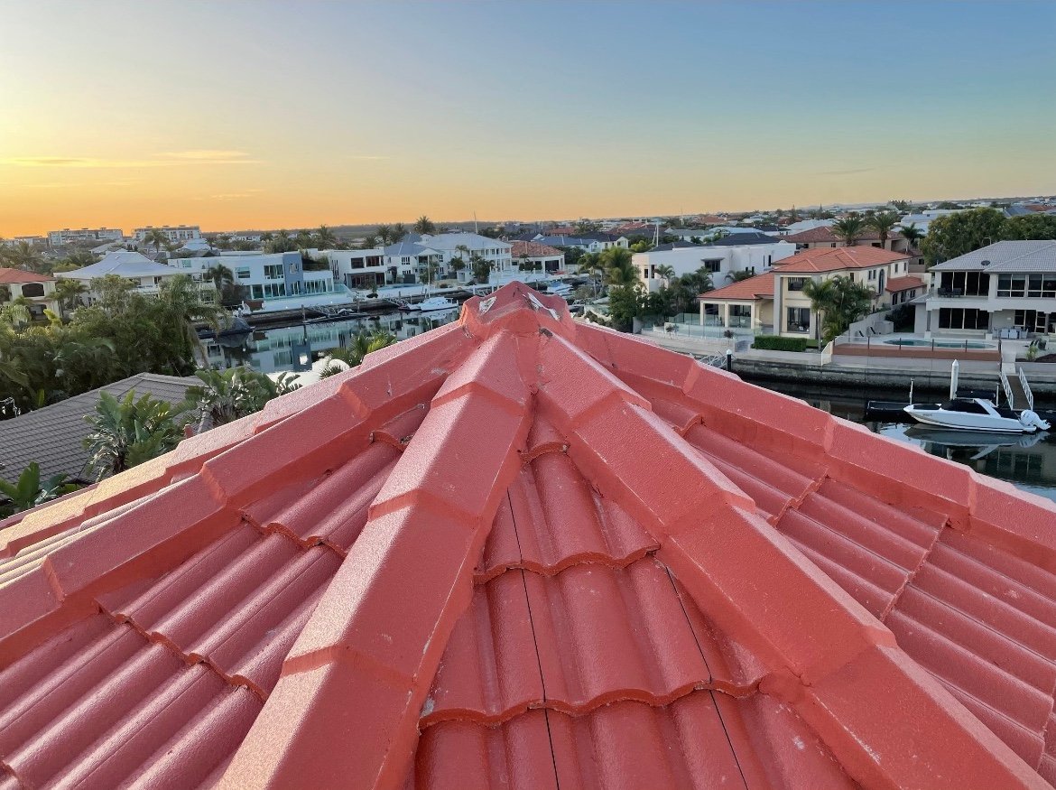 Gold Coast tiled roof with repaired ridge caps, ensuring weatherproofing and durability