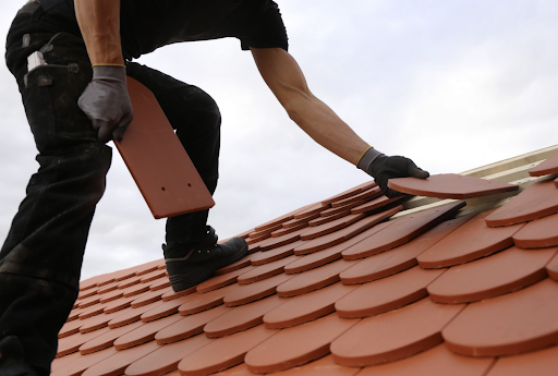 Gold Coast tile roof with signs of damage, highlighting common myths about roof leaks